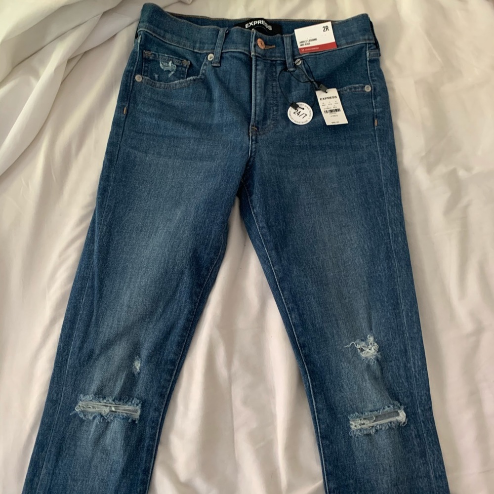 Express Raw Hem Slightly Distressed Stretch Jeans